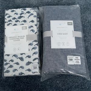 Pottery barn crib skirt and changing pad cover.